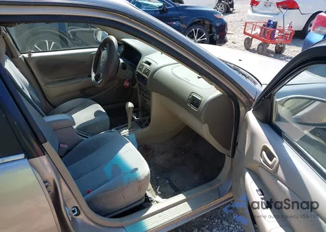 2001 Toyota Corolla Le from USA, damaged, VIN 2T1BR12E41C397393